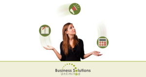 Woman business owner juggling tasks for her small business
